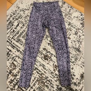 Purple snakeskin workout leggings